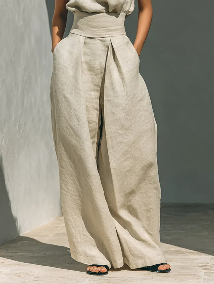 Conjunto de algodón y lino caqui: pantalón de pernera ancha con abertura frontal.