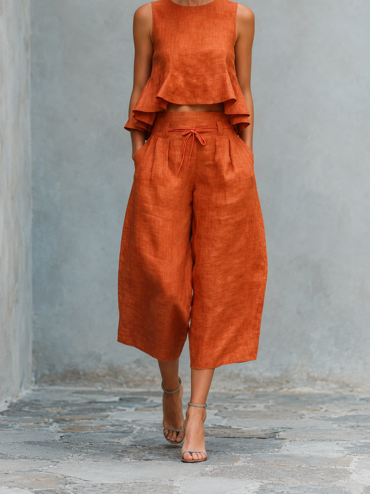 Conjunto mujer naranja: blusa sin mangas con volantes y pantalón amplio con lazo