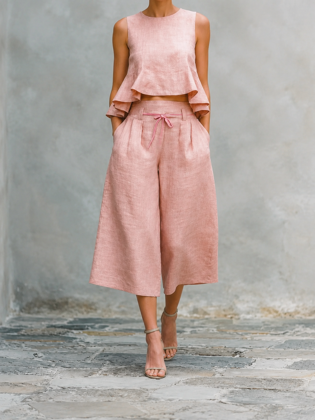 Conjunto mujer rosa: blusa sin mangas con volantes y pantalón amplio con lazo