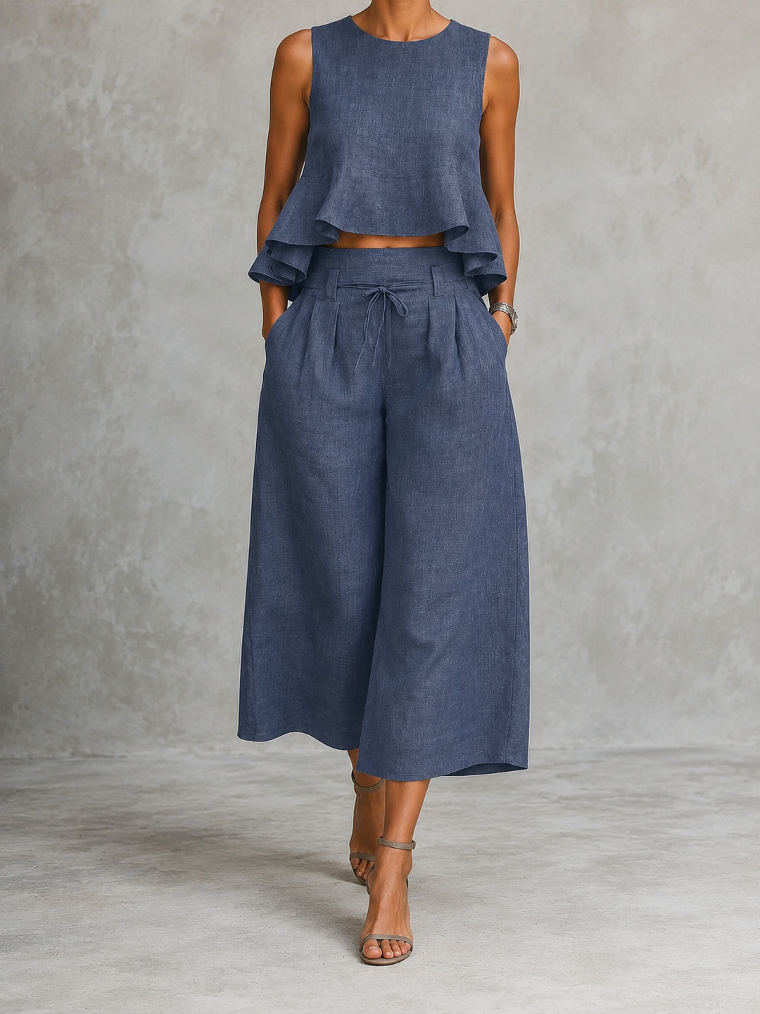 Conjunto mujer azul marino: blusa sin mangas con volantes y pantalón amplio con lazo