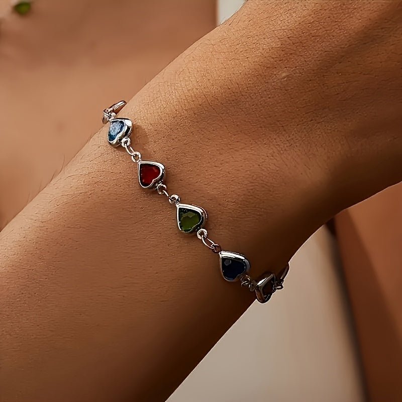 Pulsera Concepción™ con dijes de corazones en azul, rojo, verde y negro