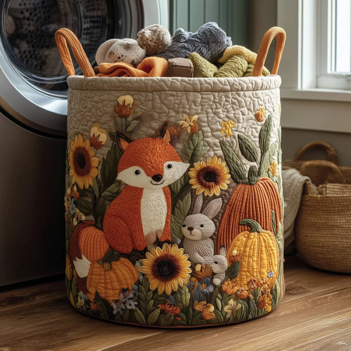Cesta acolchada con zorrito y animales, flores bordadas y tela texturizada.