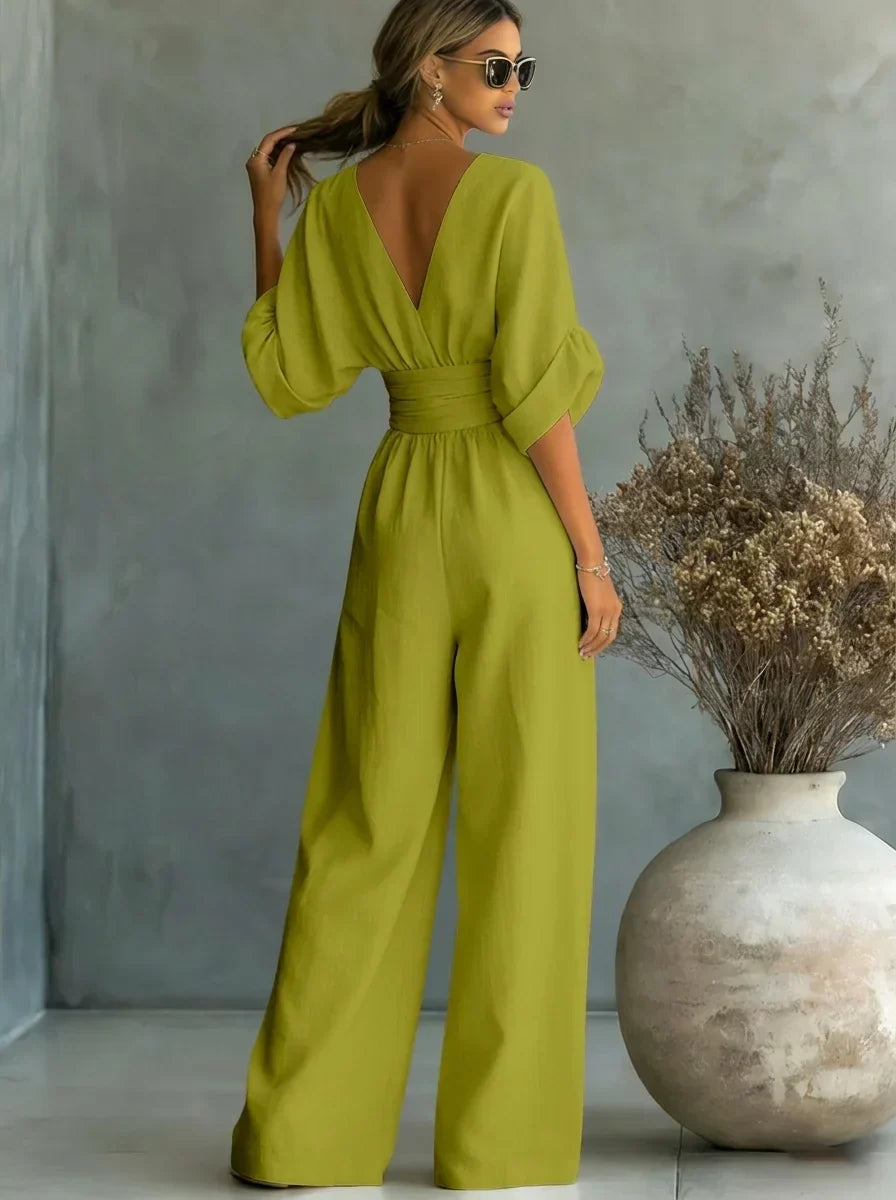 Mono verde oliva con escote en V, mangas abullonadas y pantalón ancho fruncido en la cintura