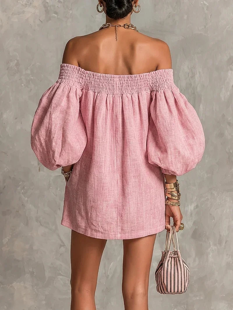 Vestido mini rosa con espalda descubierta y mangas globo voluminosas, escote sin tirantes