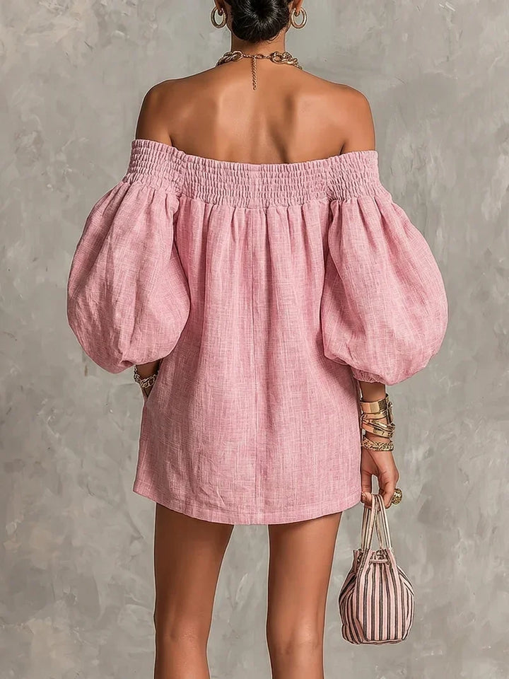 Vestido mini rosa con espalda descubierta y mangas globo voluminosas, escote sin tirantes