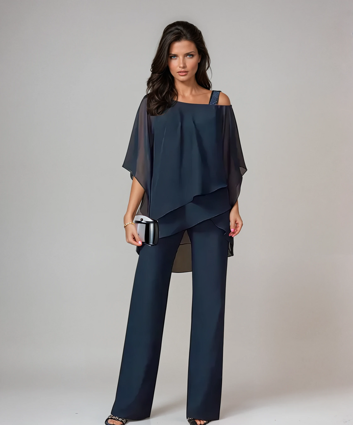 Conjunto de dos piezas azul marino: blusa con vuelo y pantalón de pierna ancha