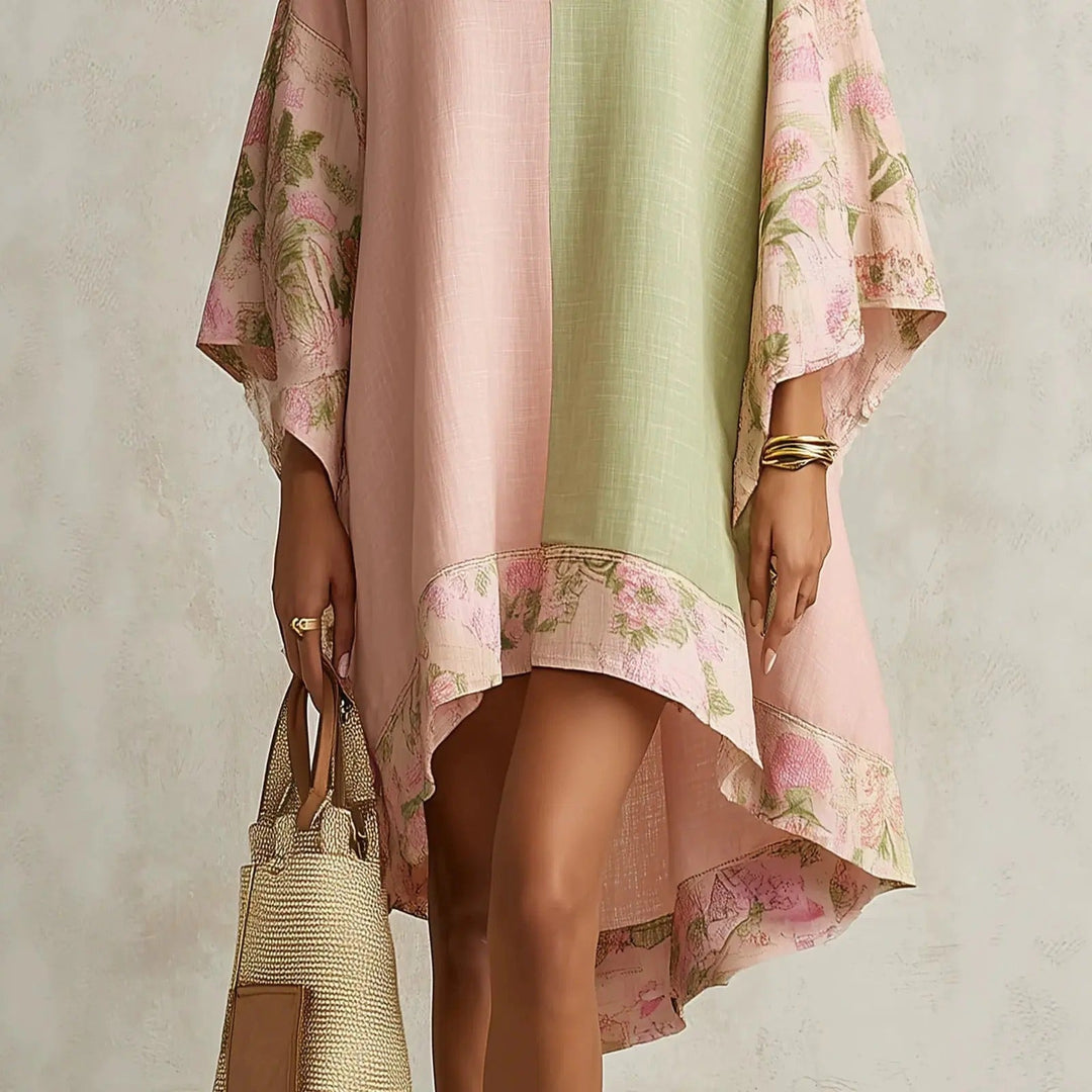 Vestido bohemio bicolor rosa y verde con dobladillo floral y caída asimétrica