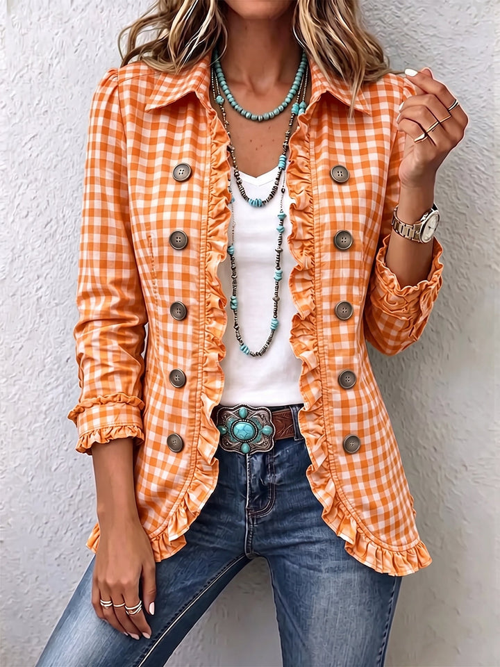 Chaqueta de cuadros Vichy naranja con volantes y botones decorativos.