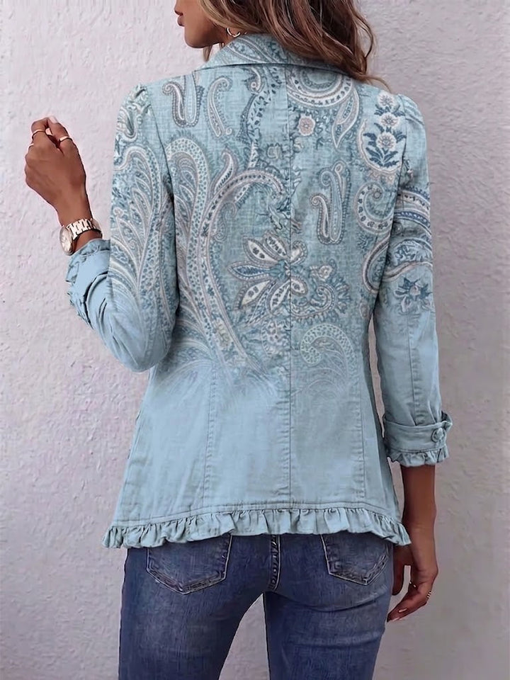 Chaqueta vintage azul claro con estampado paisley y volantes en la parte inferior